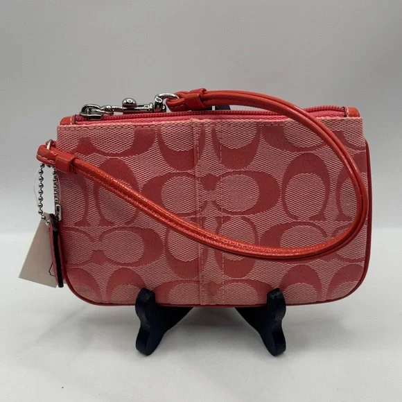 Coach Signature Skinny Wristlet pomegranate color peachy pink color classic NWT - Picture 1 of 9